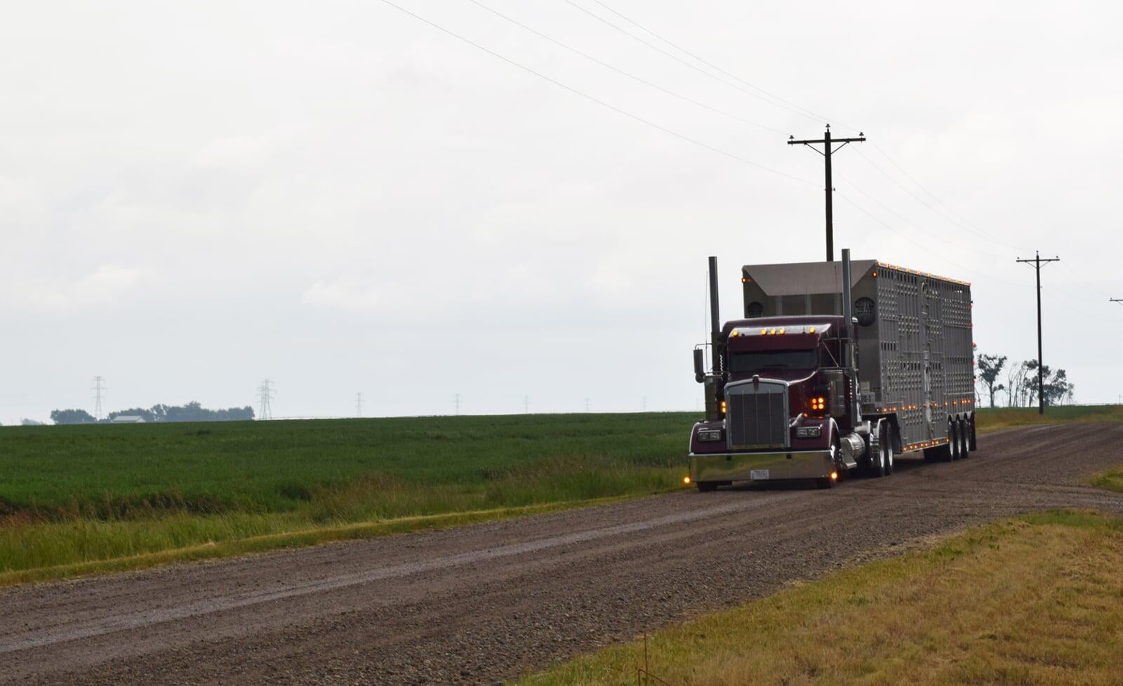 Future13 truck hauling freight on a rural road